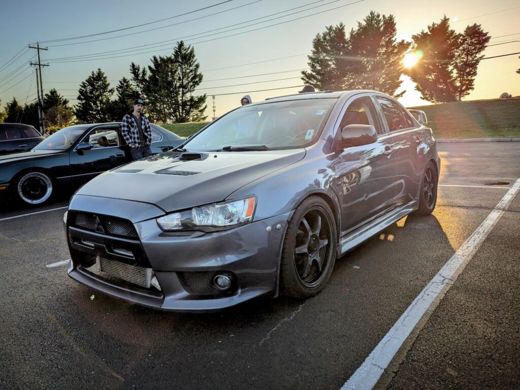 Mitsubishi Lancer Evolution X - Driver's side, front 3/4