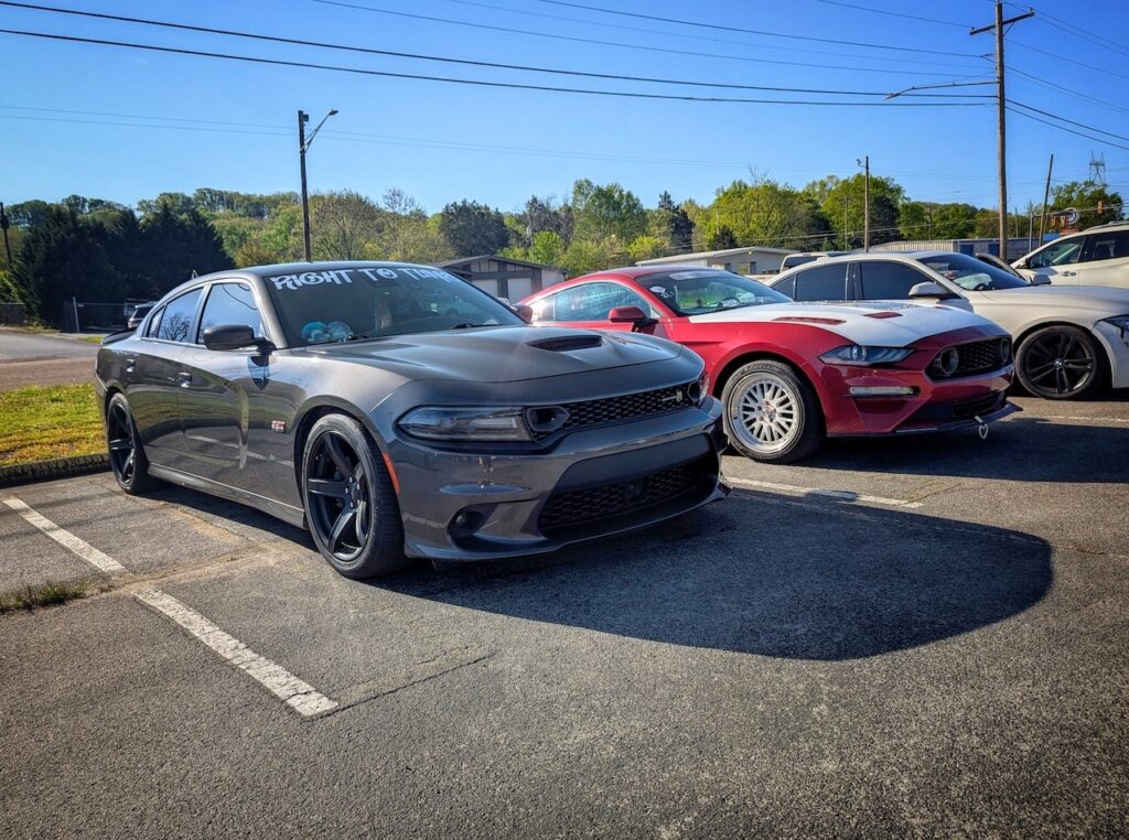 Dodge Charge, Ford Mustang - Passenger's side, front 3/4